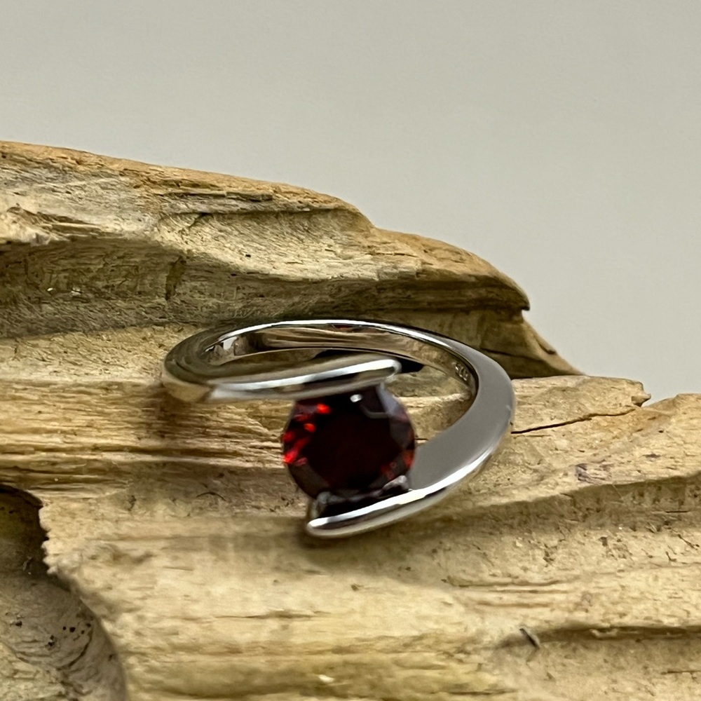 Sophisticated Sterling Silver and Red Garnet CZ Ring with Asymmetrical Design
